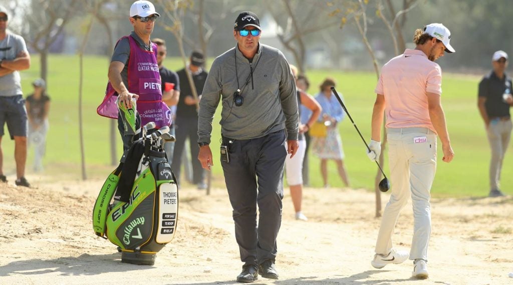 Thomas Pieters and his golf bag featuring 'For Sale' signs at the 2019 Qatar Masters.