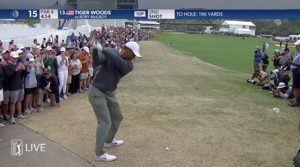 196 out. Hardpan lie. No big deal for Tiger Woods.