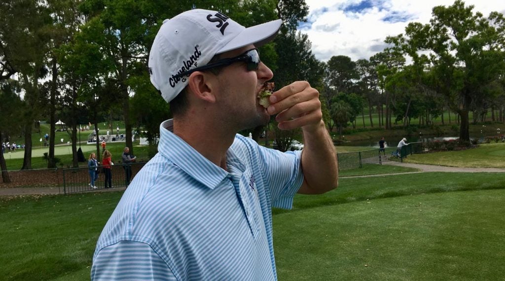 Martin Trainer chows down on a crabcake avocado open-faced slider – a big-time win.