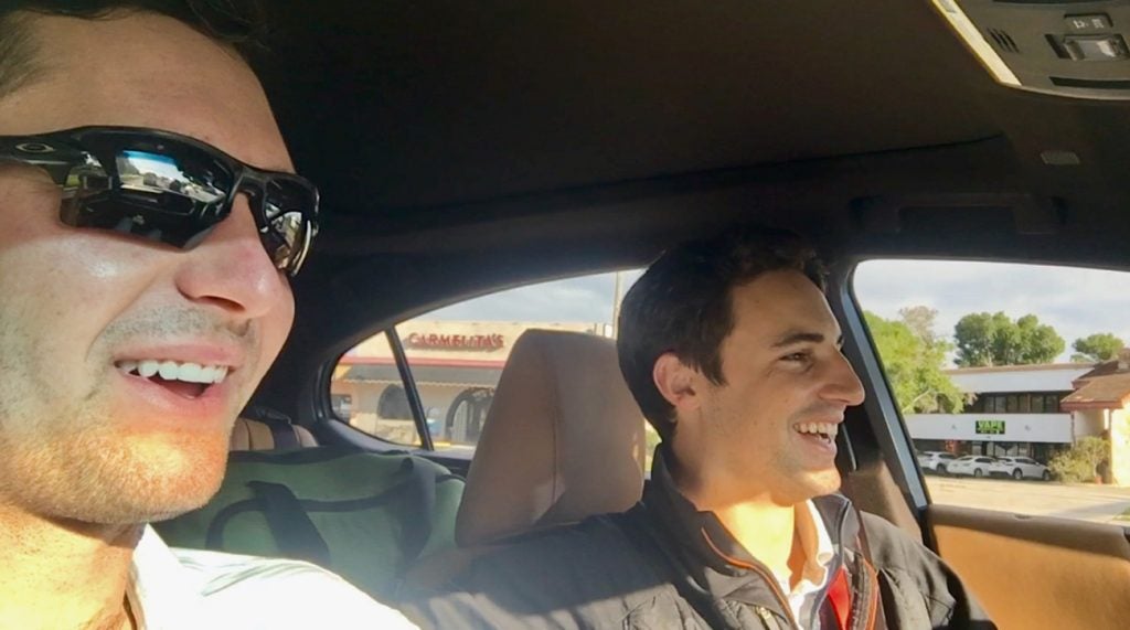 Just a golfer and his (brand new) caddie sharing a laugh in the car.