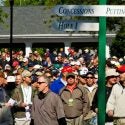 Masters patrons flood through the gates at Augusta National Golf Club.