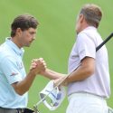 Kevin Kisner and Ian Poulter shake hands after their match on Wednesday at the WGC-Dell Technologies Match Play.