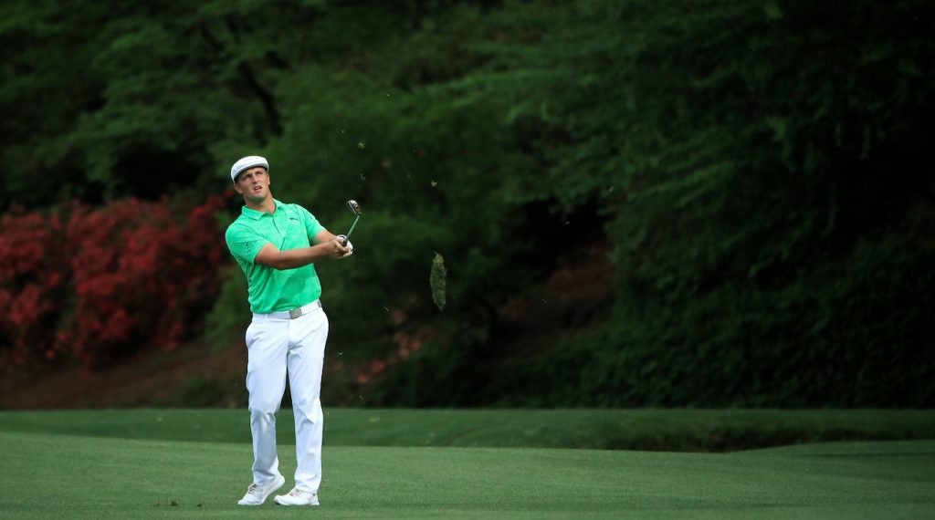 Bryson DeChambeau eyes an iron shot during the first round of the Masters.