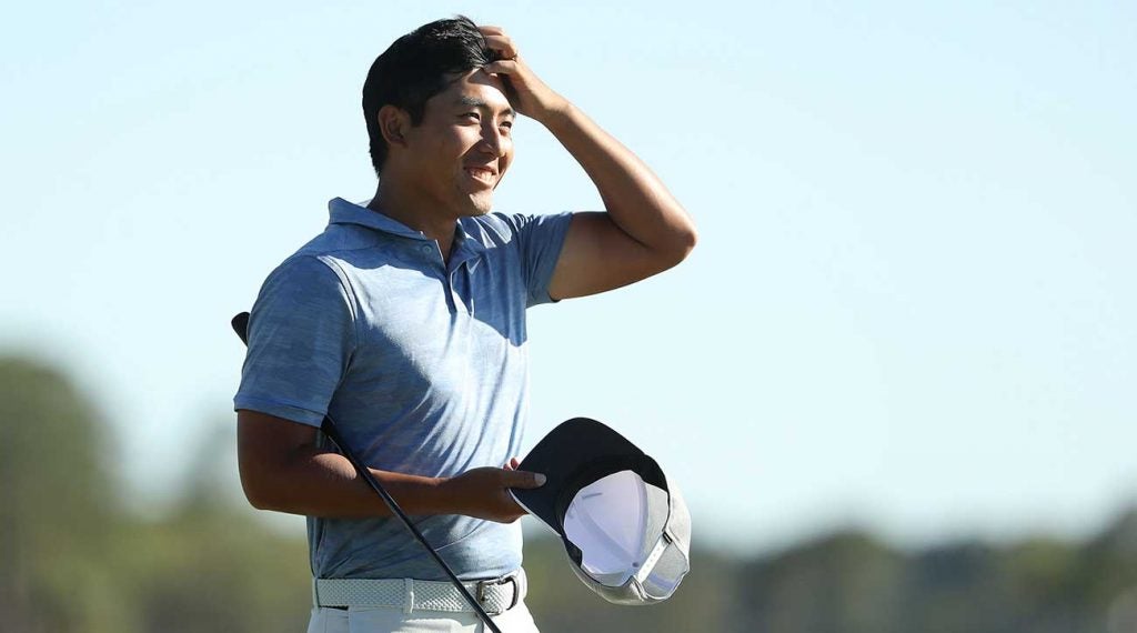 C.T. Pan walks off the 18th green on Sunday at the RBC Heritage.