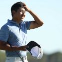 C.T. Pan walks off the 18th green on Sunday at the RBC Heritage.