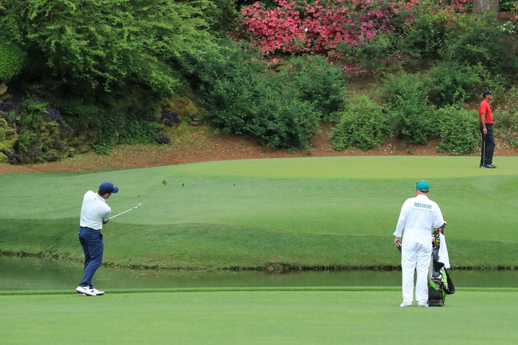 Francesco Molinari plays his third shot on the 12th hole during the final round of the Masters.