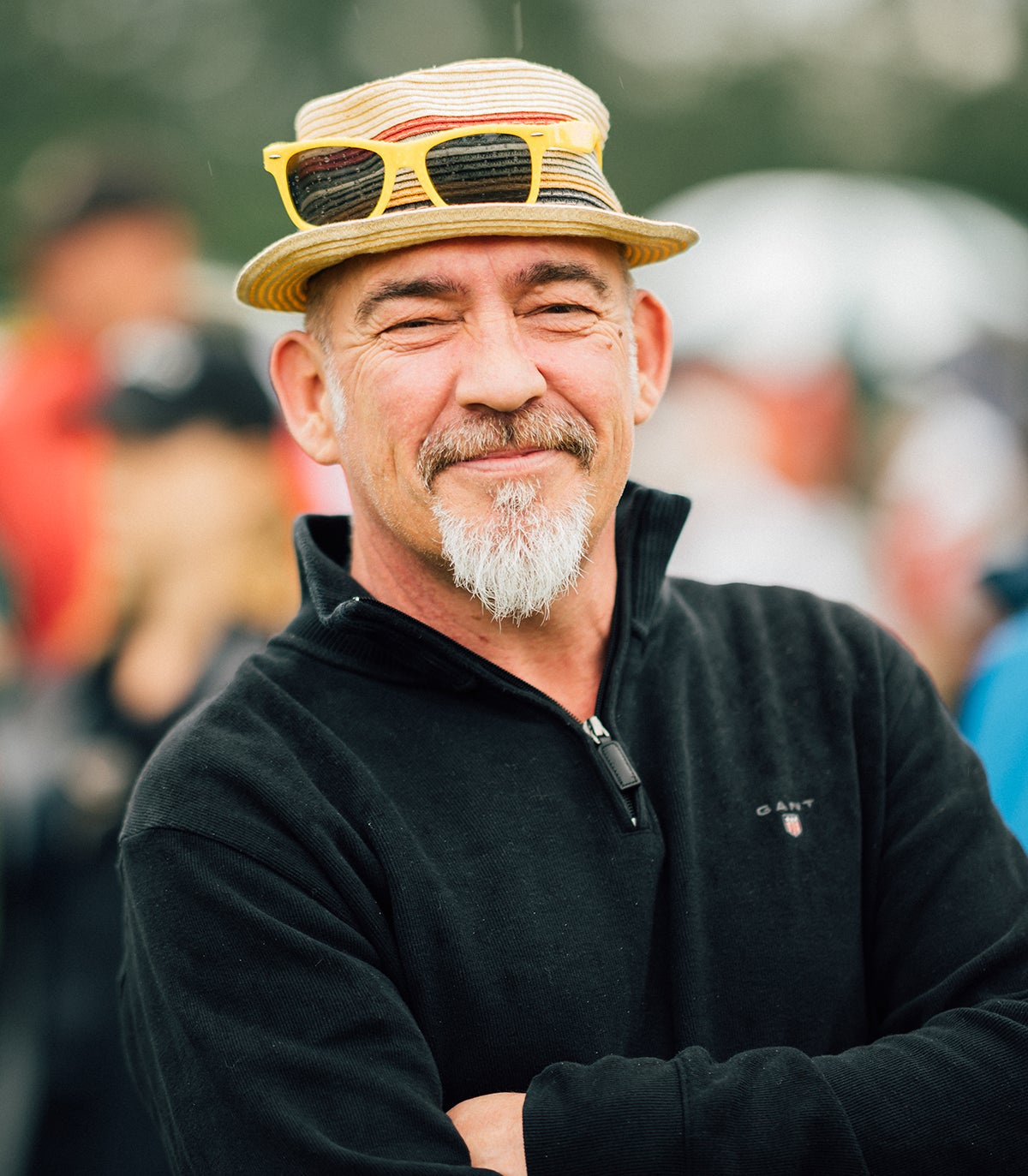 Nothing could keep this patron from smiling, even though his sunglasses were drenched in water.