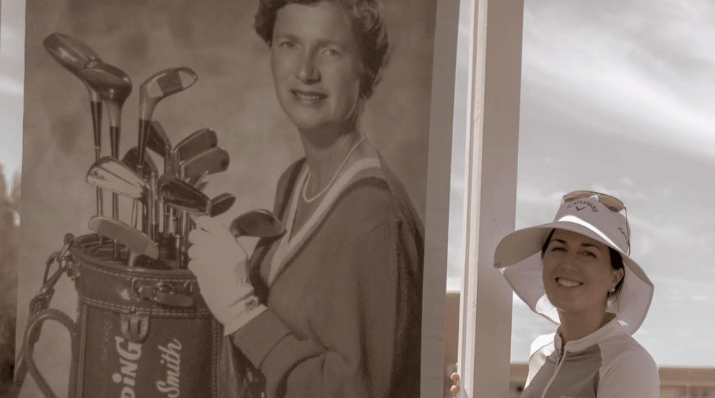 Gal poses next to a photo of Marilynn Smith during her playing days.