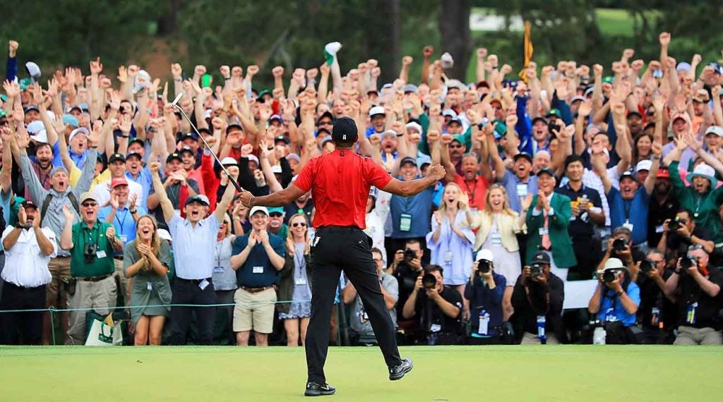 Woods, and about 25,000 fans, went crazy after his final putt dropped.