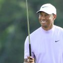 Tiger Woods smiles during the third round of the Masters.