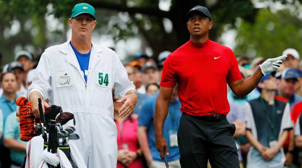 Tiger Woods' caddie Joe LaCava gave him a few key words of advice after bogeys at 4 and 5.