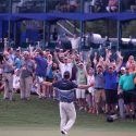 The crowd reacts to Kevin Kisner's walk-up music at the Zurich Classic.