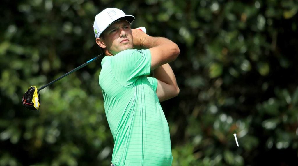 Bryson DeChambeau tees off during a Masters practice round.