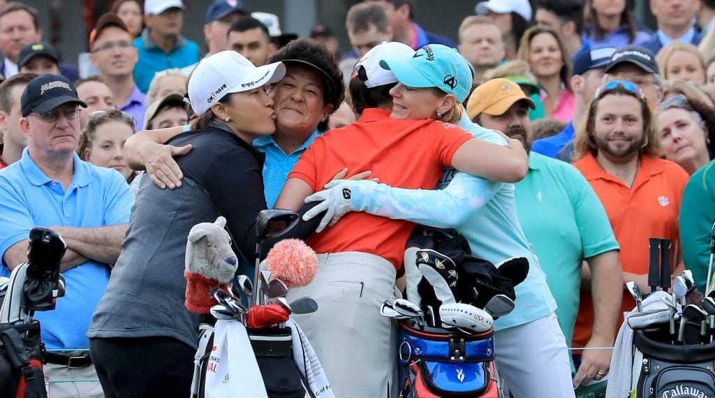 Se Ri Pak, Nancy Lopez, Lorena Ochoa and Annika Sorenstam embrace after hitting their ceremonial tee shots Saturday morning.