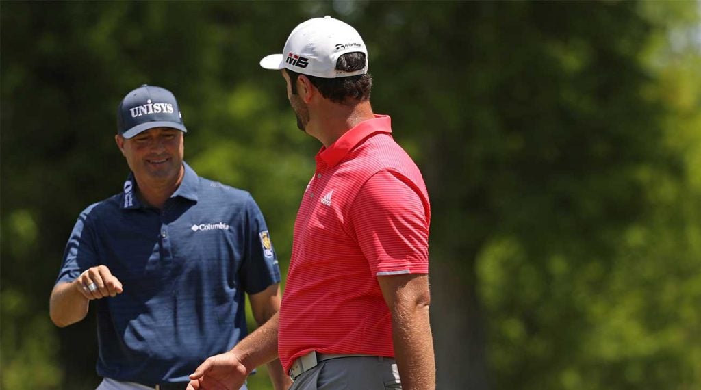 Ryan Palmer and Jon Rahm celebrate during the final round of the Zurich Classic on Sunday.