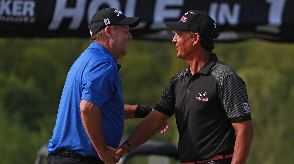 Scott Hoch and Tom Pernice Jr. shake hands after winning the PGA Tour Champions' Bass Pro Shops Legends of Golf at Big Cedar Lodge on Sunday.