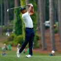 Tiger Woods hits a tee shot during the second round of the Masters on Friday.