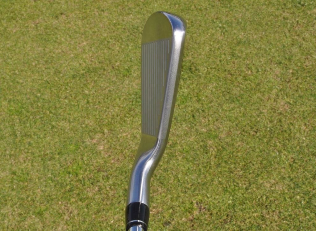 Titleist CP-01 iron at address.