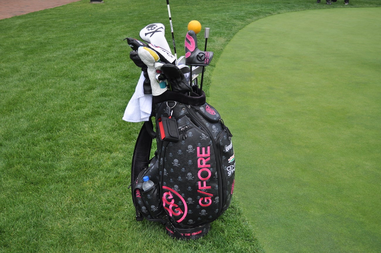 Brian Gay's pink and black GFore staff bag is impossible to miss on the putting green. 
