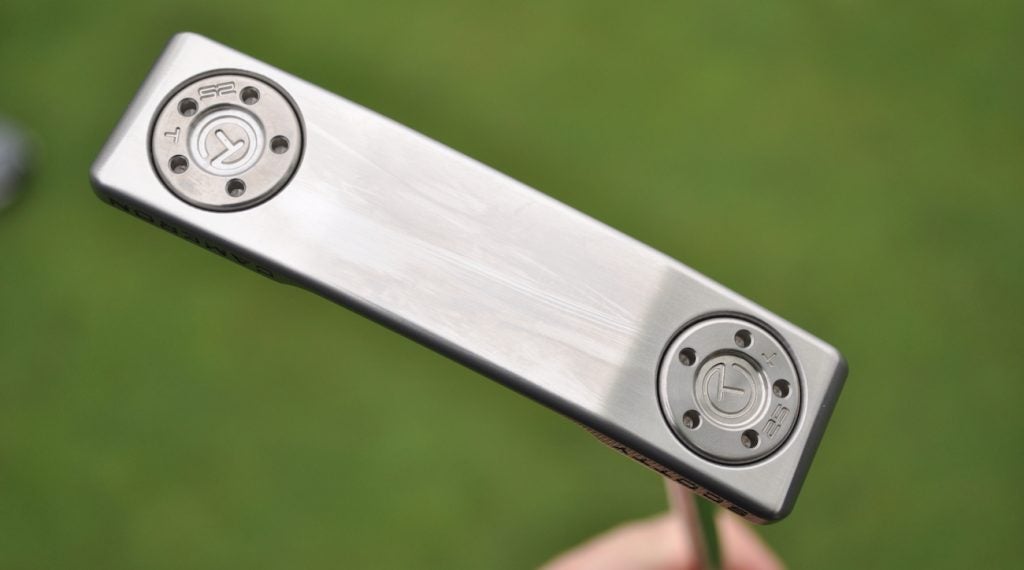 The putter features 25-gram heel-toe sole weights. 
