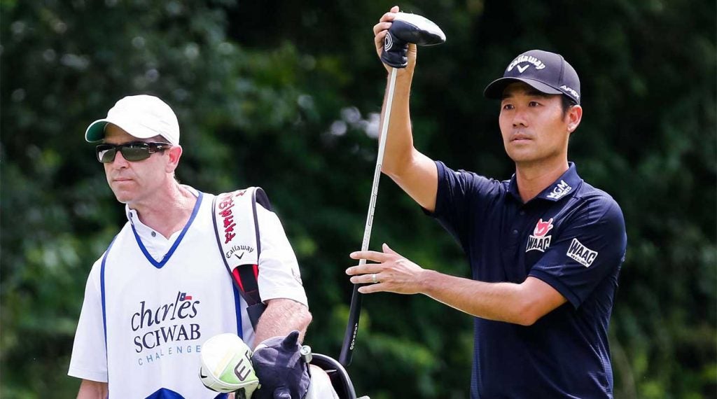Kevin Na and caddie Kenny Harms get ready to play a shot on Sunday at Colonial.