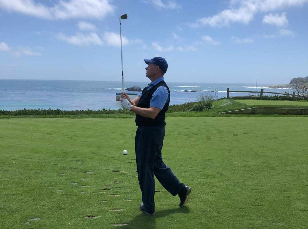 Even Mike Davis can't resist a round at Pebble Beach.