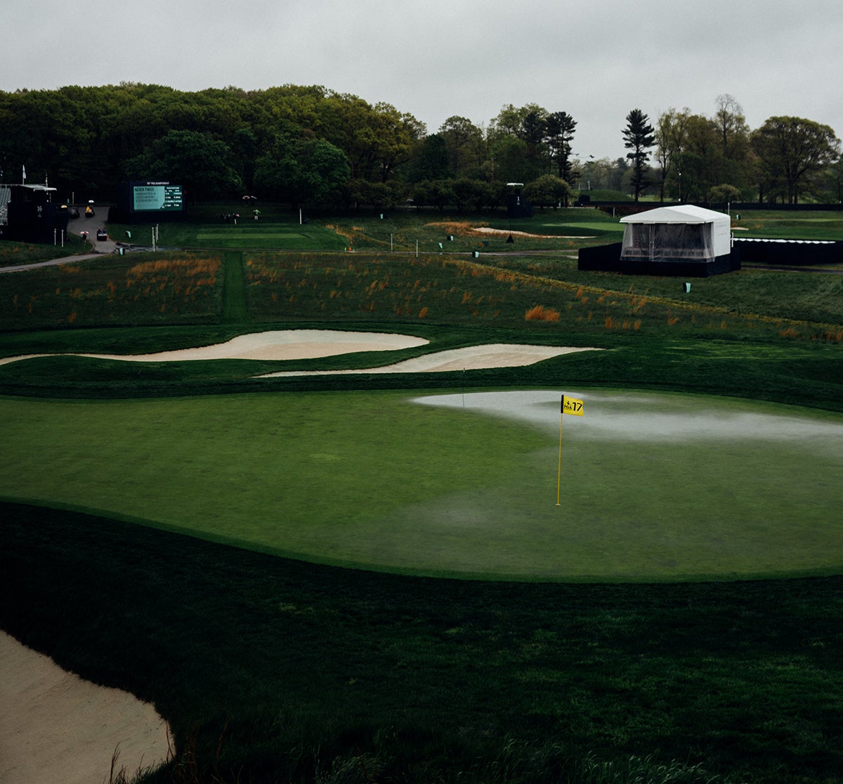 A rain-soaked 17th green.