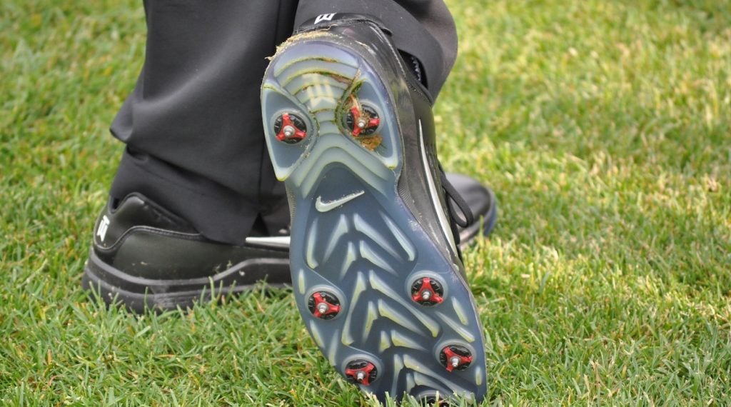 Tiger Woods was wearing metal spikes on Wednesday at the Memorial Tournament.