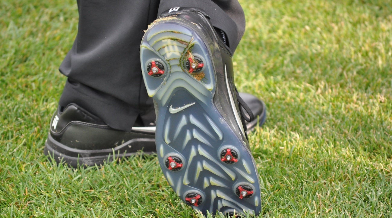 The reason Tiger Woods continues to wear metal spikes