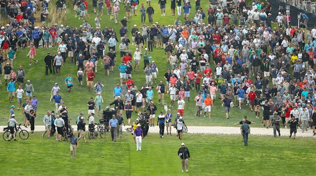Brooks Koepka, and hundreds of others, walks off the 18th tee on Sunday of the PGA Championship.