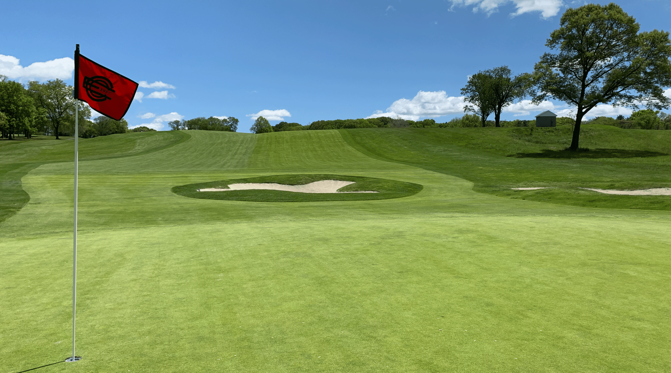 The course occupies a rolling piece of land about 20 miles east of Manhattan. 