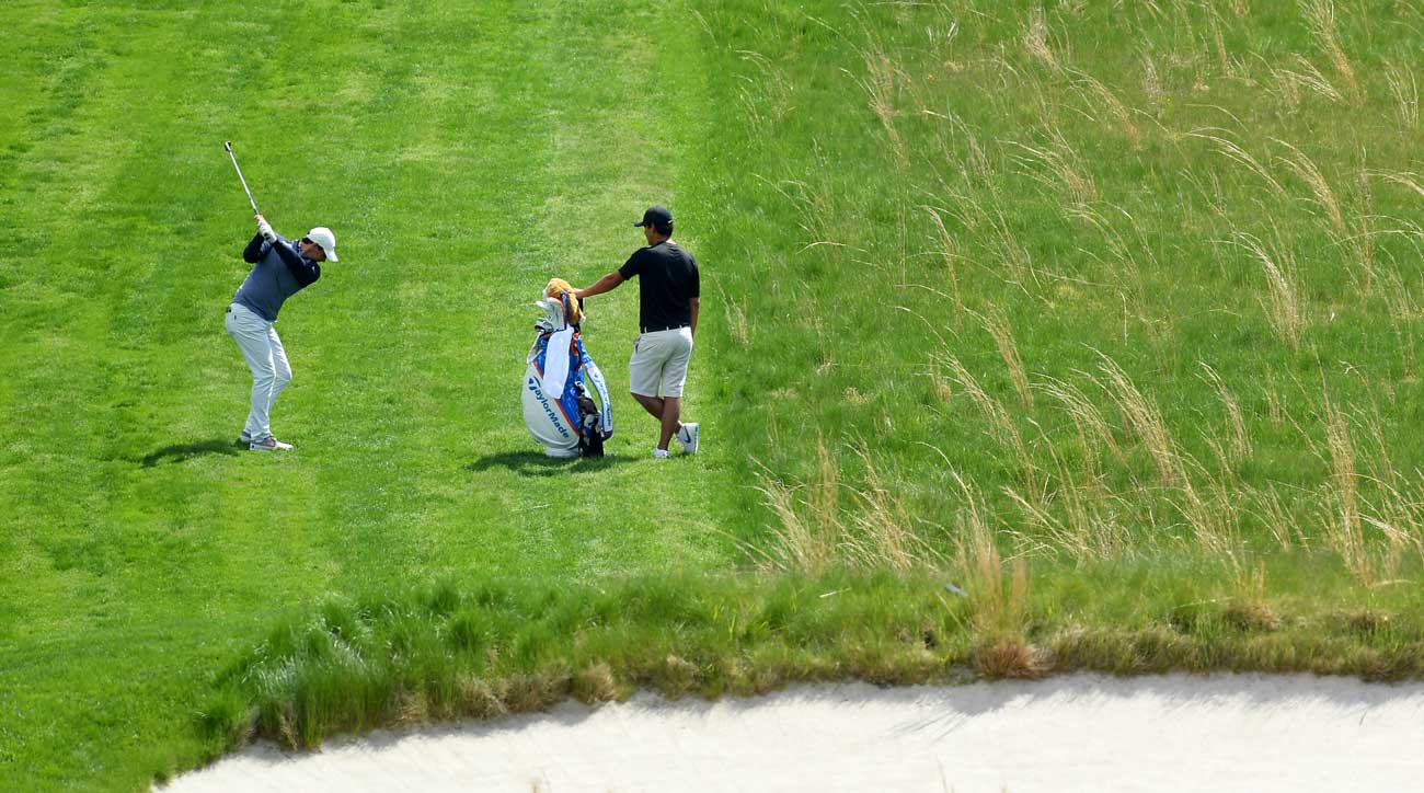 Rory McIlroy and his caddie Harry Diamond on the 18th hole at Bethpage Black.