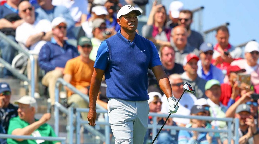 Tiger Woods walks off the tee during the first round of the 2019 PGA Championship.