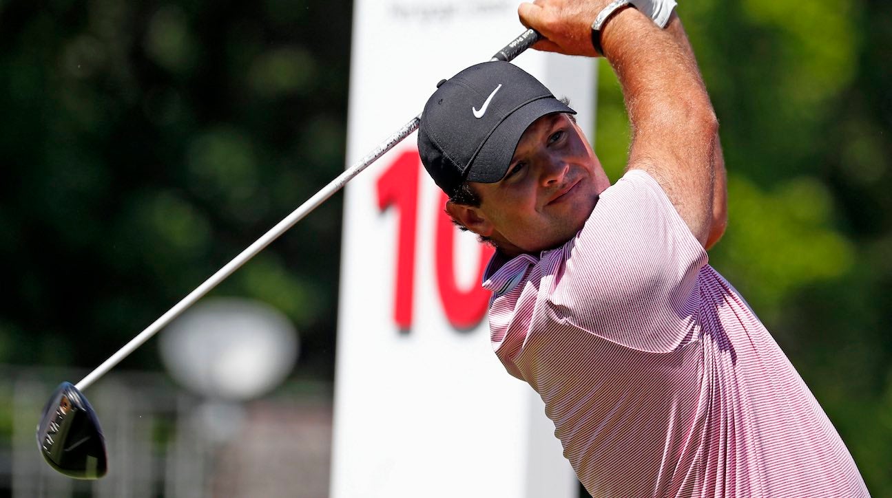 Jun 27, 2019; Detroit, MI, USA; Patrick Reed hits his tee shot on the 10th hole during the first round of the Rocket Mortgage Classic golf tournament at Detroit Golf Club. Mandatory Credit: Brian Spurlock-USA TODAY Sports