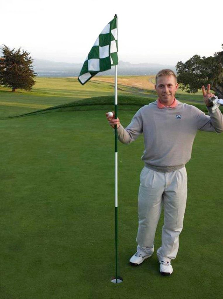 Mike Duncan poses for a photo after his miraculous shot.