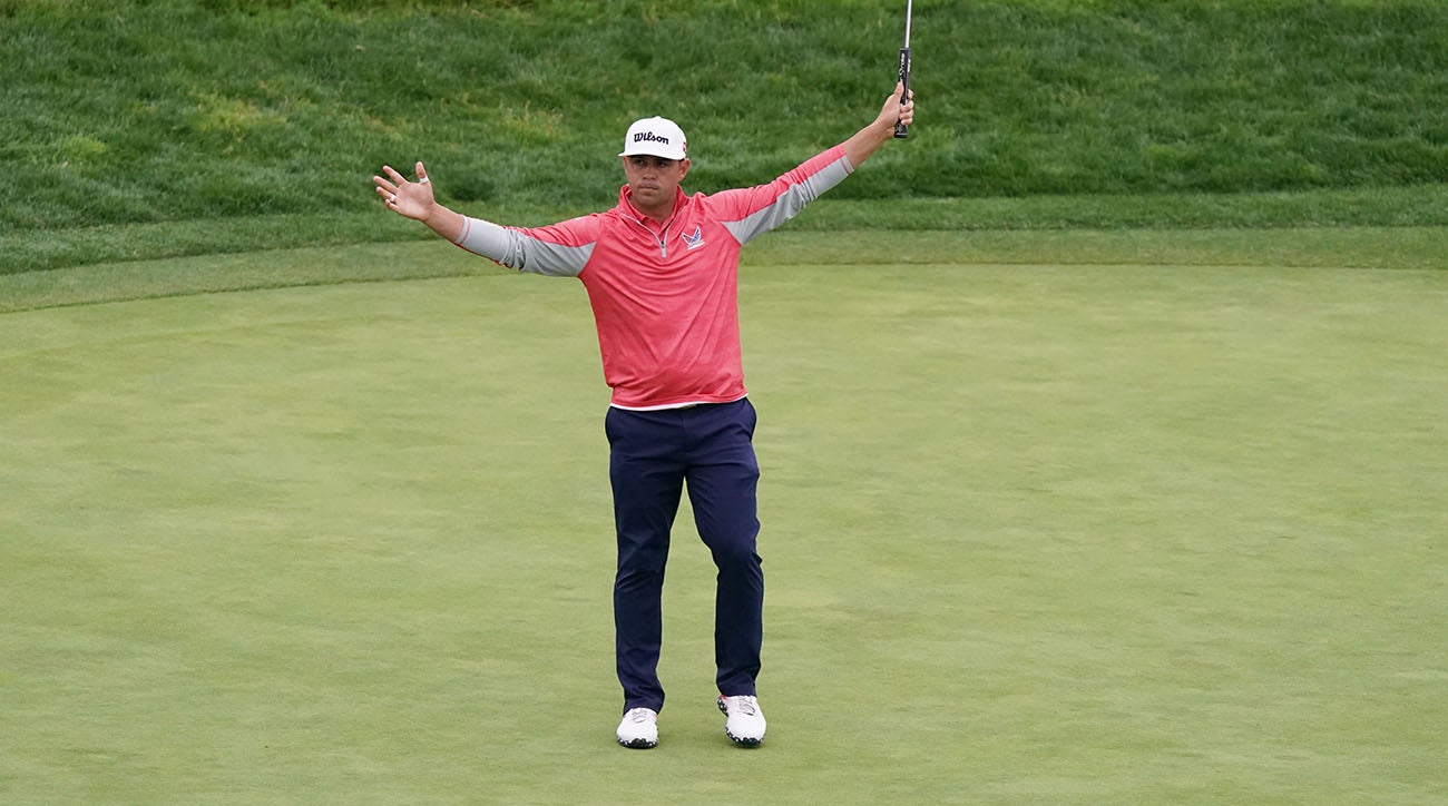 Woodland celebrated his three-shot win at Pebble Beach.
