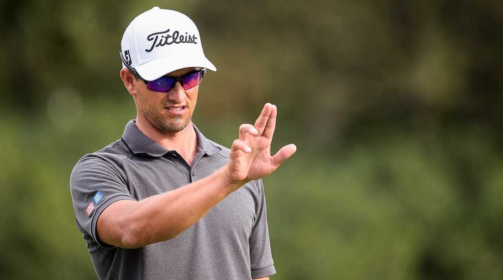 Adam Scott uses AimPoint, but Adam Scott knows how to use AimPoint.
