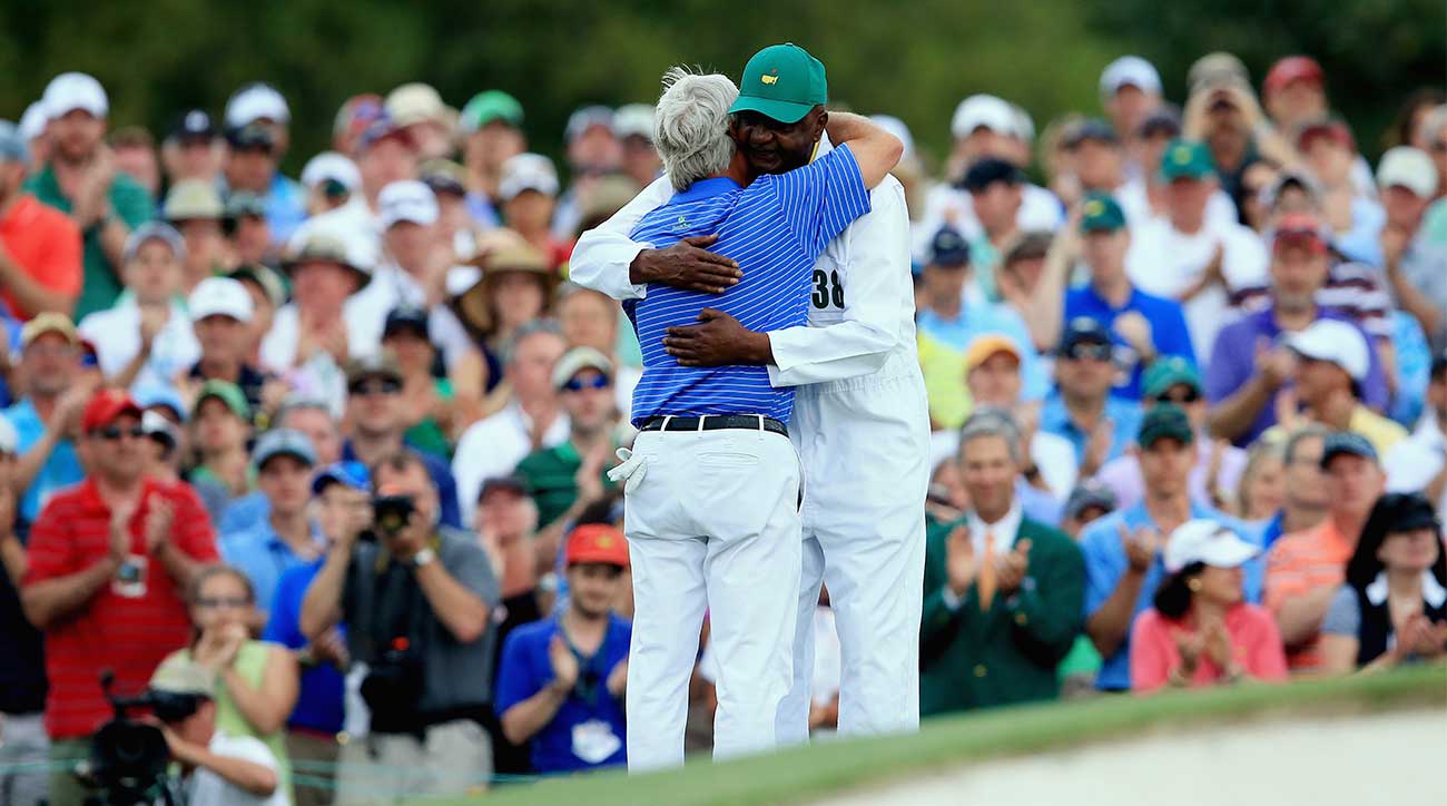 Ben Crenshaw hugs longtime caddie Carl Jackson on the 18th green after playing in his final Masters during the second round of the 2015 Masters.