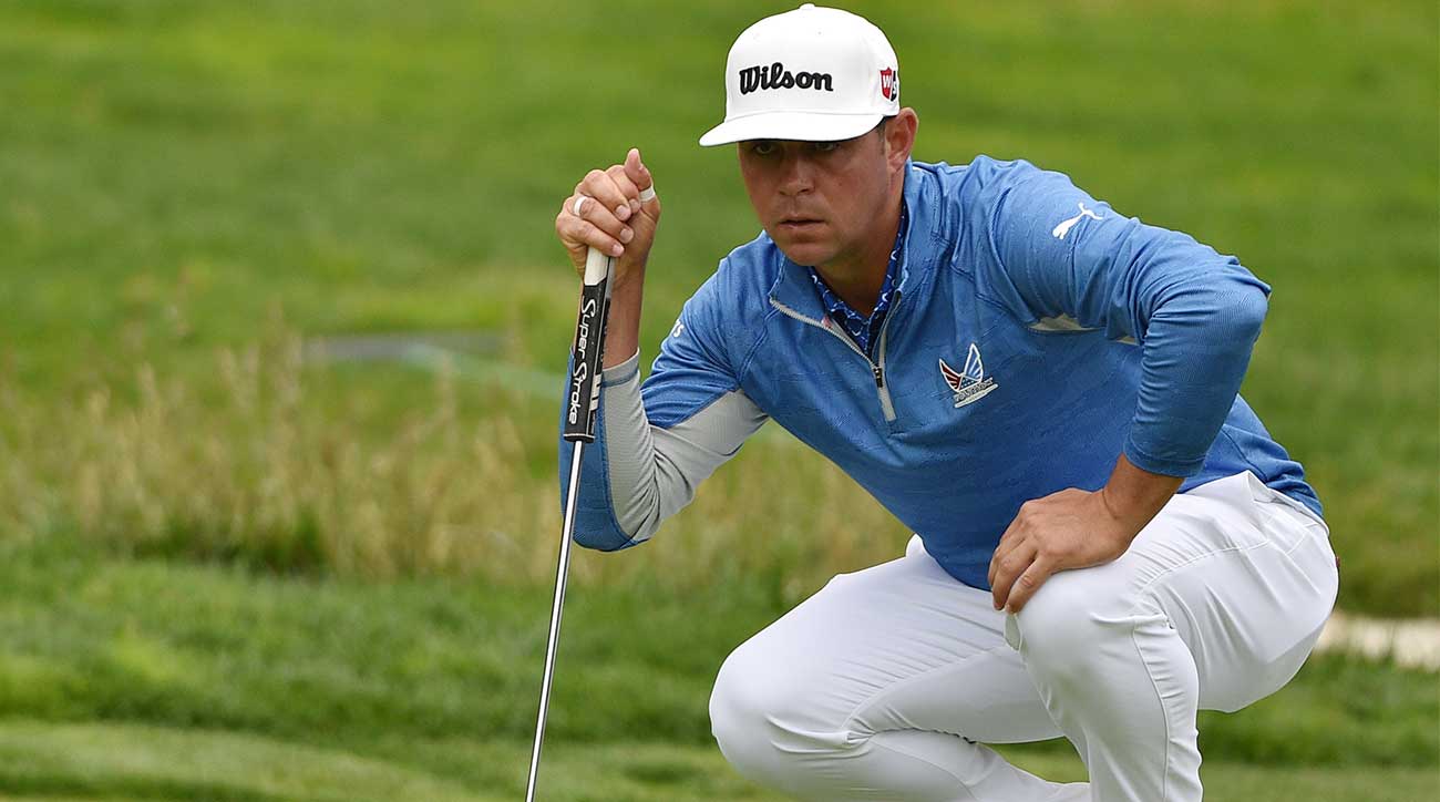 Gary Woodland reads a putt during the third round of the U.S. Open.