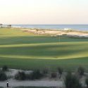 The 18th hole at the Ocean Course at Hammock Beach Resort runs right along the beach.