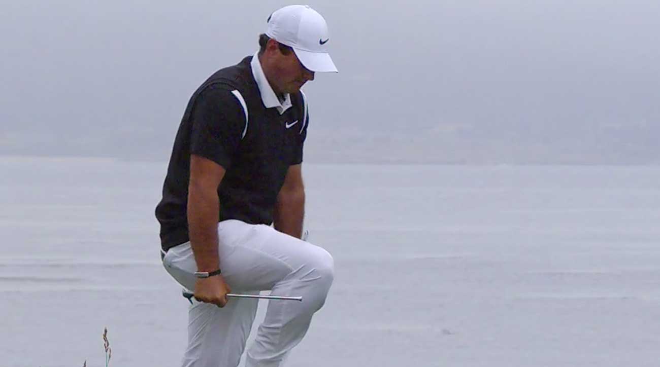 Patrick Reed snaps a club after chunking a chip during the second round of the U.S. Open.