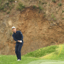 Justin Rose plays a chip shot in the final round of the 2019 U.S. Open.