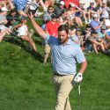 Zack Sucher celebrates his chip-in par on the final hole of the Travelers Championship.