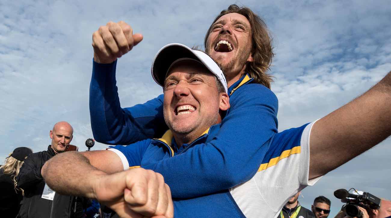 PARIS, FRANCE - SEPTEMBER 30: Ian Poulter and Tommy Fleetwood celebrate victory after the singles matches of the 2018 Ryder Cup at Le Golf National on September 30, 2018 in Paris, France. (Photo by Richard Heathcote/Getty Images)