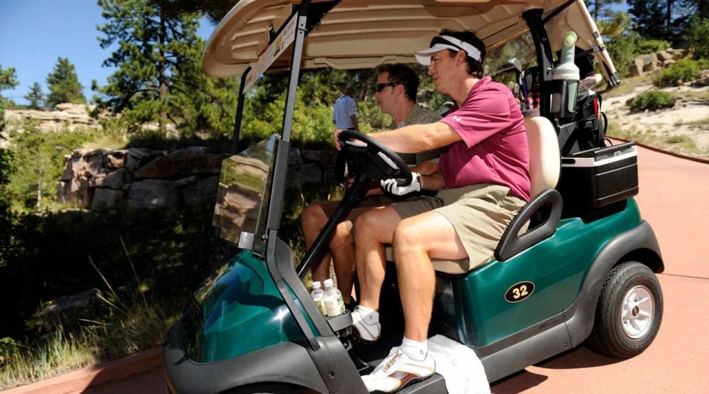 Golfers in cart