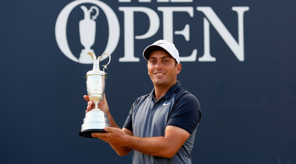 Francesco Molinari of Italy poses with the Claret Jug after his victory in the 147th Open Championship.