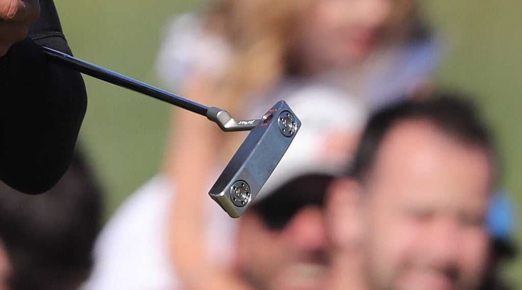 Tiger Woods was seen testing a second Scotty Cameron putter. 