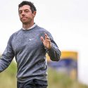 Rory McIlroy walks off the 18th green at Royal Portrush after missing the cut on Friday.