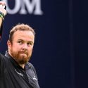 Shane Lowry waves to the crowd after his eight-under 63 on Saturday at Royal Portrush.