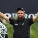 Shane Lowry waves to the crowd after winning the Open Championship.